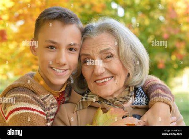 Dwina holding her grandson Max (Son of RJ and Megan) Bee gees, Andy