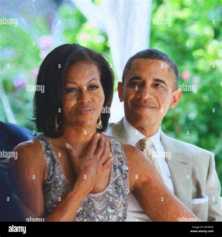 June 18 2012; First Lady Michelle Obama reacts as she watches Laura