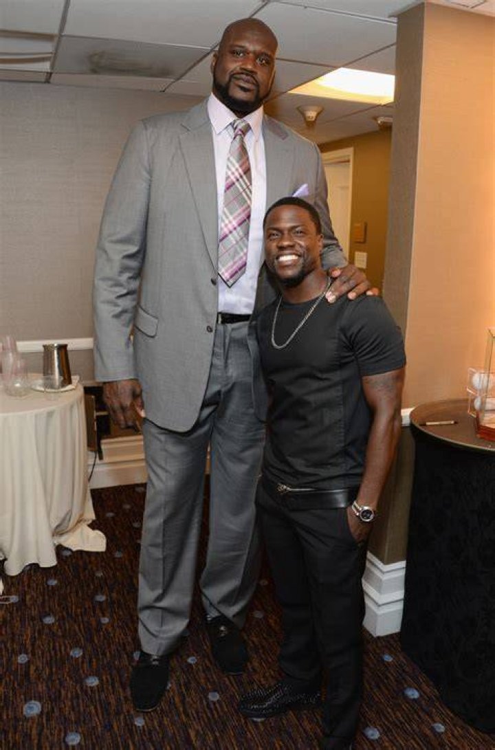 Shaq next to a replica of the tallest man to have lived pics